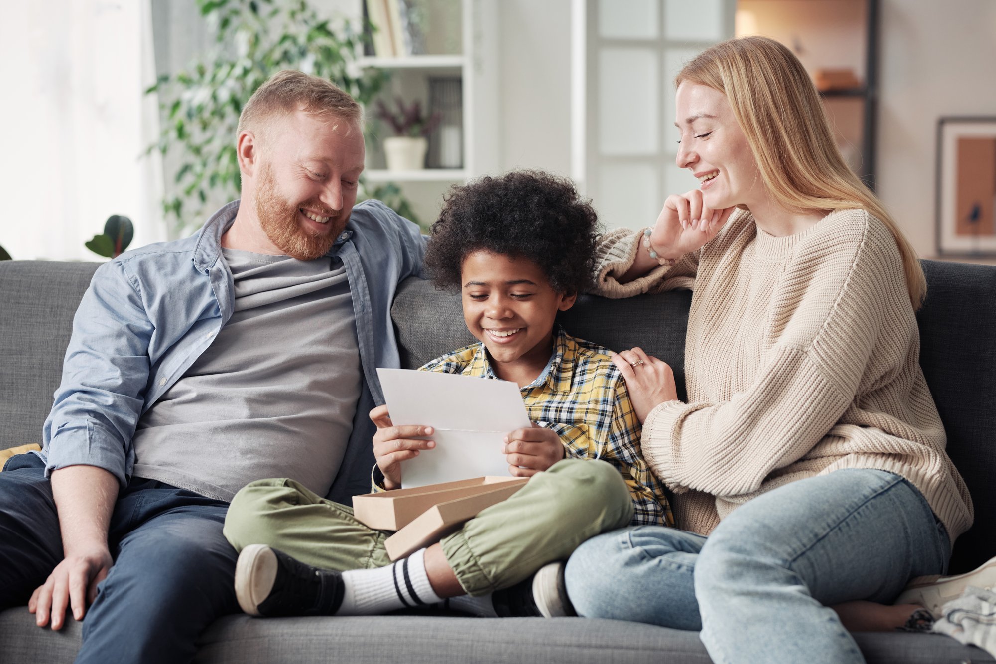 happy-child-reading-a-letter-about-adoption-2022-07-14-04-46-12-utc